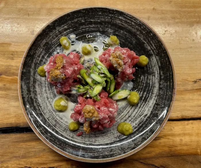 Cruda di vitello con ricci di mare &mdash; Casa Dama, braceria a Torino
